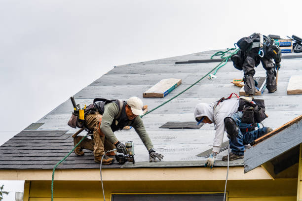 Professional Roofing technician working in Portland, ME